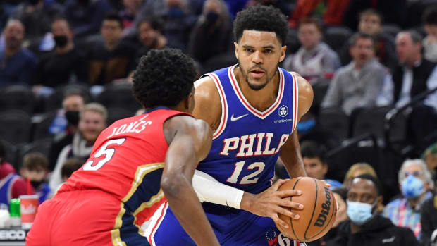 Jan 25, 2022; Philadelphia, Pennsylvania, USA; Philadelphia 76ers forward Tobias Harris (12) is defended by New Orleans Pelicans forward Herbert Jones (5) during the second quarter at Wells Fargo Center. Mandatory Credit: Eric Hartline-USA TODAY Sports